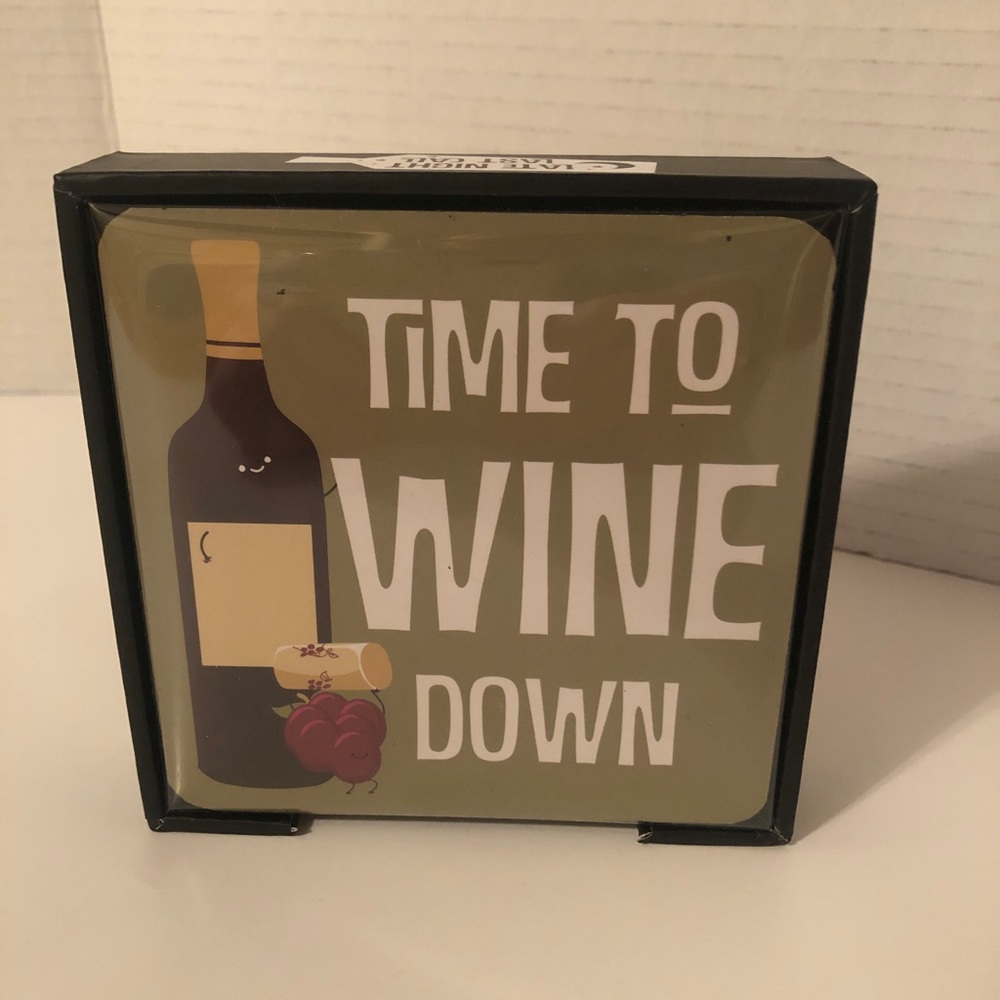 Coaster Set 4 piece set with cork backing. Brand New.